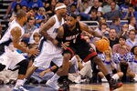 ORLANDO, FL - DECEMBER 21: LeBron James #6 of the Miami Heat posts up against Quentin Richardson #5 of the Orlando Magic during a preseason game  at Amway Center on December 21, 2011 in Orlando, Florida. NOTE TO USER: User expressly acknowledges and agrees that, by downloading and/or using this Photograph, User is consenting to the terms and conditions of the Getty Images License Agreement.  (Photo by Mike Ehrmann/Getty Images)