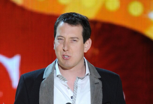 LAS VEGAS, NV - DECEMBER 05:  NASCAR driver Kyle Busch speaks onstage at the American Country Awards 2011 at the MGM Grand Garden Arena on December 5, 2011 in Las Vegas, Nevada.  (Photo by Ethan Miller/Getty Images)