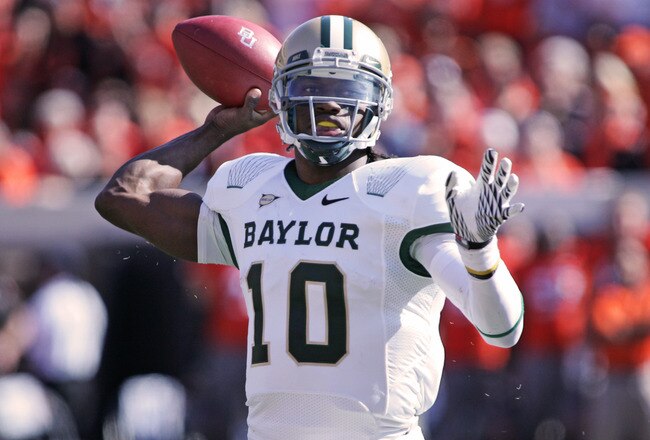 STILLWATER, OK - OCTOBER 29:  Quarterback Robert Griffin III #10 of the Baylor Bears looks to throw in the first half against the Oklahoma State Cowboys on October 29, 2011 at Boone Pickens Stadium in Stillwater, Oklahoma.  Oklahoma State defeated Baylor 59-24.  (Photo by Brett Deering/Getty Images)