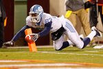 BLACKSBURG, VA - NOVEMBER 17: Dwight Jones #83 of the North Carolina Tar Heels dives with the ball against the Virginia Tech Hokies at Lane Stadium on November 17, 2011 in Blacksburg, Virginia. (Photo by Geoff Burke/Getty Images)  (Photo by Geoff Burke/Getty Images)
