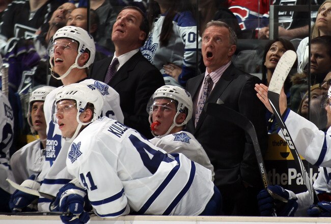 LOS ANGELES, CA - JANUARY 10: Head coach Ron Wilson (R) of the Toronto Maple Leafs reacts to a scoreboard video replay during the game against the Los Angeles Kings at the Staples Center on January 10, 2011 in Los Angeles, California. The Leafs defeated the Kings 3-2. (Photo by Bruce Bennett/Getty Images)
