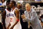PHILADELPHIA, PA - APRIL 24: Coach Doug Collins of the Philadelphia 76ers gestures to players Jrue Holiday #11 (L) and Jodie Meeks #20 during the second half in Game Four of the Eastern Conference Quarterfinals in the 2011 NBA Playoffs at Wells Fargo Center on April 24, 2011 in Philadelphia, Pennsylvania. NOTE TO USER: User expressly acknowledges and agrees that, by downloading and/or using this Photograph, User is consenting to the terms and conditions of the Getty Images License Agreement.  (Photo by Rob Carr/Getty Images)