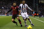 WEST BROMWICH, ENGLAND - DECEMBER 26:  Jerome Thomas of West Bromwich and Sergio Aguero of Manchester City battle for the ball during the Barclays Premier League match between West Bromwich Albion and Manchester City at The Hawthorns on December 26, 2011 in West Bromwich, England.  (Photo by Dean Mouhtaropoulos/Getty Images)