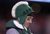 INDIANAPOLIS, IN - DECEMBER 03:  A fan of the Michigan State Spartans stands with his head down against the Wisconsin Badgers during the Big 10 Conference Championship Game at Lucas Oil Stadium on December 3, 2011 in Indianapolis, Indiana.  (Photo by Andy Lyons/Getty Images)