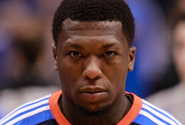 DALLAS, TX - MAY 19:   Nate Robinson #3 of the Oklahoma City Thunder looks on during the national anthem before Game Two of the Western Conference Finals during the 2011 NBA Playoffs agains the Dallas Mavericks at American Airlines Center on May 19, 2011 in Dallas, Texas. NOTE TO USER: User expressly acknowledges and agrees that, by downloading and or using this photograph, User is consenting to the terms and conditions of the Getty Images License Agreement.  (Photo by Tom Pennington/Getty Images)
