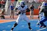 BOISE, ID - OCTOBER 22:  Tim Jefferson Jr. #7 of the Air Force Falcons looks for a receiver against the Boise State Broncos at Bronco Stadium on October 22, 2011 in Boise, Idaho.  (Photo by Otto Kitsinger III/Getty Images)