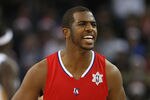 OAKLAND, CA - DECEMBER 25:  Chris Paul #3 of the Los Angeles Clippers celebrates against the Golden State Warriors during the season opener at Oracle Arena on December 25, 2011 in Oakland, California.  NOTE TO USER: User expressly acknowledges and agrees that, by downloading and or using this photograph, User is consenting to the terms and conditions of the Getty Images License Agreement.  (Photo by Jed Jacobsohn/Getty Images)