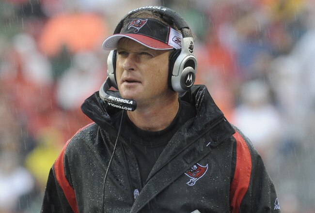TAMPA, FL - NOVEMBER 30:  Coach Jon Gruden of the Tampa Bay Buccaneers checks the scoreboard against the New Orleans Saints at Raymond James Stadium on November 30, 2008 in Tampa, Florida.  (Photo by Al Messerschmidt/Getty Images)