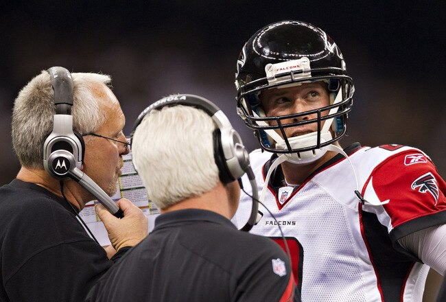NEW ORLEANS, LA - DECEMBER 26:   Matt Ryan #2 of the Atlanta Falcons talks with his coaches on the sidelines during a game against the New Orleans Saints at Mercedes-Benz Superdome on December 26, 2011 in New Orleans, Louisiana.  The Saints defeated the Falcons 45-16.  (Photo by Wesley Hitt/Getty Images)