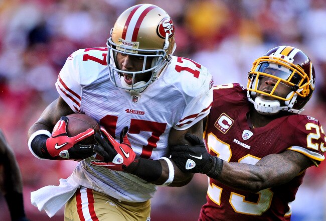 LANDOVER, MD - NOVEMBER 6: Wide receiver Braylon Edwards #17 of the San Francisco 49ers eludes cornerback DeAngelo Hall #23 of the Washington Redskins during the third quarter at FedExField on November 6, 2011 in Landover, Maryland. The San Francisco 49ers won, 19-11. (Photo by Patrick Smith/Getty Images)