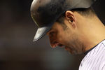 NEW YORK, NY - OCTOBER 06:  Jorge Posada #20 of the New York Yankees walks back to the dugout with his head down after he grounded out in the bottom of the eighth inning against the Detroit Tigers during Game Five of the American League Championship Series at Yankee Stadium on October 6, 2011 in the Bronx borough of New York City.  (Photo by Nick Laham/Getty Images)