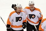 DALLAS, TX - DECEMBER 21:  Claude Giroux #28 of the Philadelphia Flyers celebrates a goal with Jaromir Jagr during the first period against the Dallas Stars at American Airlines Center on December 21, 2011 in Dallas, Texas.  (Photo by Ronald Martinez/Getty Images)