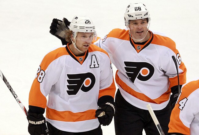 DALLAS, TX - DECEMBER 21:  Claude Giroux #28 of the Philadelphia Flyers celebrates a goal with Jaromir Jagr during the first period against the Dallas Stars at American Airlines Center on December 21, 2011 in Dallas, Texas.  (Photo by Ronald Martinez/Getty Images)