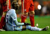 LIVERPOOL, ENGLAND - NOVEMBER 27:  Mario Balotelli of Manchester City reacts after a challenge on Martin Skrtel of Liverpool for which he was subsequently sent off  during the Barclays Premier League match between Liverpool and Manchester City at Anfield on November 27, 2011 in Liverpool, England.  (Photo by Alex Livesey/Getty Images)