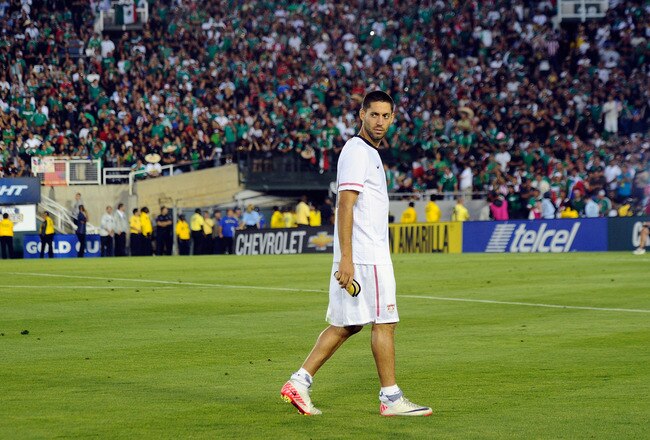 PASADENA, CA - JUNE 25: Clint Dempsey #8 of the United States reacts after receiving his silver medal follwoing his team's defeat to Mexico in the 2011 CONCACAF Gold Cup Championship at the Rose Bowl on June 25, 2011 in Pasadena, California.  (Photo by Kevork Djansezian/Getty Images)