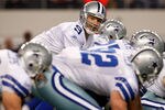 ARLINGTON, TX - DECEMBER 11:   Tony Romo #9 of the Dallas Cowboys take a snap against the New York Giants at Cowboys Stadium on December 11, 2011 in Arlington, Texas.  (Photo by Tom Pennington/Getty Images)