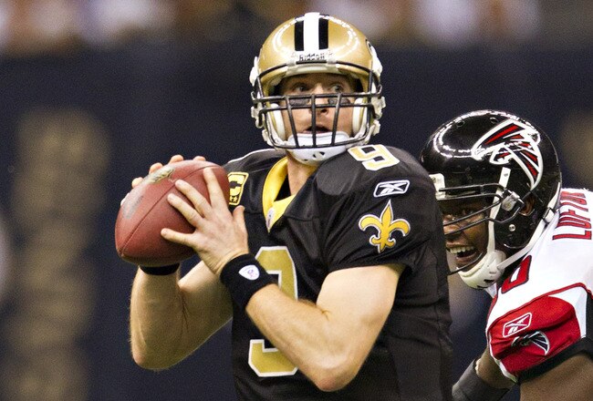 NEW ORLEANS, LA - DECEMBER 26:   Quarterback Drew Brees #9 of the New Orleans Saints drops back to pass against the Atlanta Falcons at Mercedes-Benz Superdome on December 26, 2011 in New Orleans, Louisiana.  The Saints defeated the Falcons 45-16.  (Photo by Wesley Hitt/Getty Images)