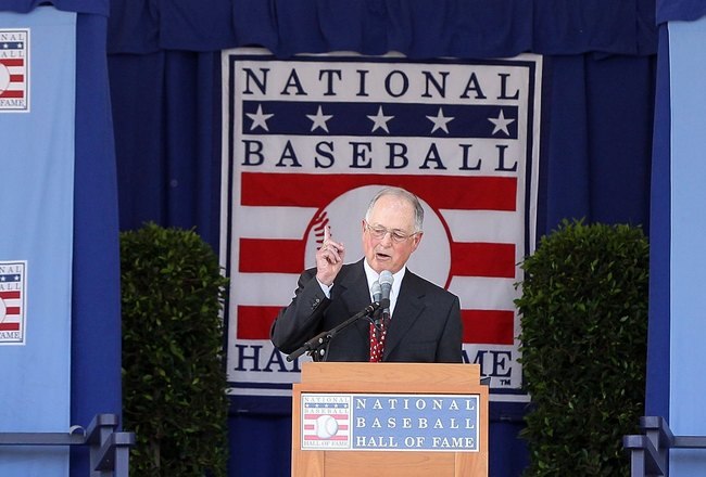COOPERSTOWN, NY - JULY 24:  Pat Gillick gives his speech at Clark Sports Center during the Baseball Hall of Fame induction ceremony on July 24, 2011 in Cooperstown, New York.Gillick spent 27 years as the general manger with four major league clubs (Toronto 1978-94, Baltimore 1996-98, Seattle 2000-03 and Philadelphia 2006-08). His teams advanced to the postseason 11 times and won the World Series in 1992, 1993 and 2008.  (Photo by Jim McIsaac/Getty Images)