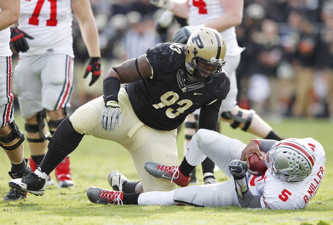 WEST LAFAYETTE, IN - NOVEMBER 12: Kawann Short #93 of the Purdue Boilermakers celebrates after sacking Braxton Miller #5 of the Ohio State Buckeyes at Ross-Ade Stadium on November 12, 2011 in West Lafayette, Indiana. Purdue defeated Ohio State 26-23 in overtime. (Photo by Joe Robbins/Getty Images)