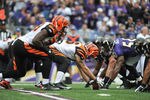 BALTIMORE - NOVEMBER 20:  Mike McGlynn #66 of the Cincinnati Bengals snaps the ball against the Baltimore Ravens at M&T Bank Stadium on November 20, 2011 in Baltimore, Maryland. The Ravens defeated the Bengals 31-24. (Photo by Larry French/Getty Images)