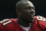 SAN FRANCISCO - SEPTEMBER 7:  Wide receiver Terrell Owens #81 of the San Francisco 49ers watches the action during the game against the Chicago Bears on September 7, 2003 at Candelstick Park in San Francisco, California. The 49ers defeated the Bears 49-7. (Photo by Jed Jacobsohn/Getty Images)