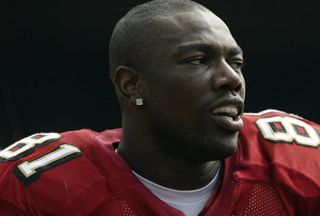 SAN FRANCISCO - SEPTEMBER 7:  Wide receiver Terrell Owens #81 of the San Francisco 49ers watches the action during the game against the Chicago Bears on September 7, 2003 at Candelstick Park in San Francisco, California. The 49ers defeated the Bears 49-7. (Photo by Jed Jacobsohn/Getty Images)
