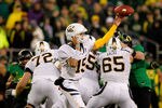 EUGENE, OR - OCTOBER 06:  Quarterback Zach Maynard #15 of the California Golden Bears throws a pass against the Oregon Ducks on October 6, 2011 at the Autzen Stadium in Eugene, Oregon.  (Photo by Jonathan Ferrey/Getty Images)