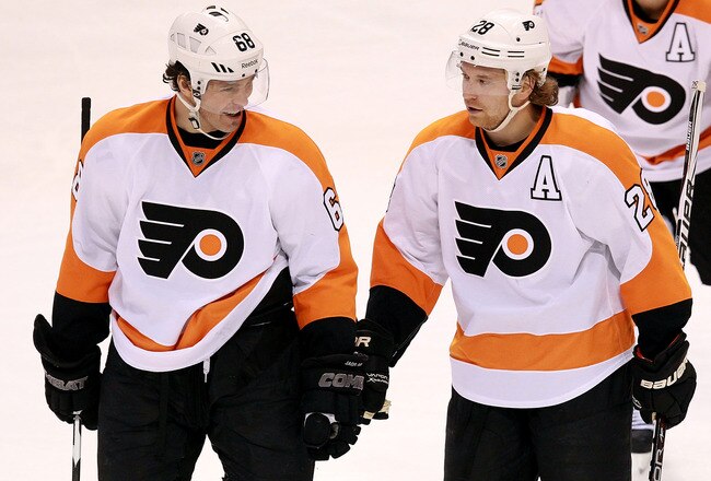 DALLAS, TX - DECEMBER 21:  Jaromir Jagr #68 of the Philadelphia Flyers celebrates his goal with Claude Giroux #28 during play against the Dallas Stars at American Airlines Center on December 21, 2011 in Dallas, Texas.  (Photo by Ronald Martinez/Getty Images)