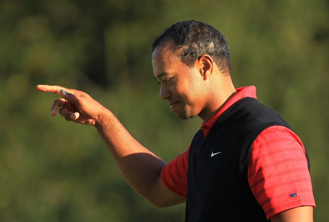 THOUSAND OAKS, CA - DECEMBER 04:  Tiger Woods celebrates his birdie putt on the 18th green to win the Chevron World Challenge at Sherwood Country Club on December 4, 2011 in Thousand Oaks, California.  (Photo by Scott Halleran/Getty Images)