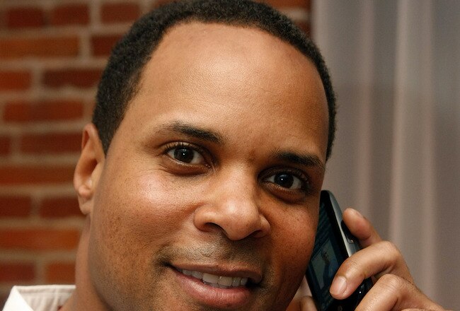 ST LOUIS, MO - JULY 13:  Retired Cinncinnati Reds' Barry Larkin uses his new palm Pre at the Palm Gift Lounge at the Ryan Howard All Star Bash at the Lumen Private Event Space on July 13, 2009 in St Louis, Missouri.   (Photo by Thomas Gannam/Getty Images for Palm)