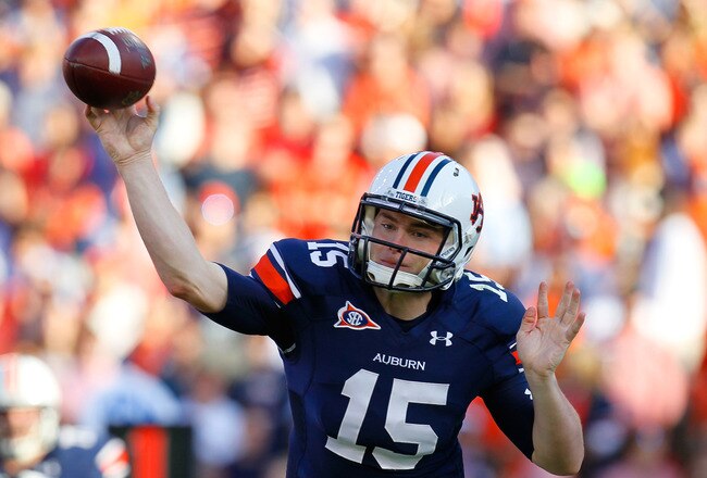 AUBURN, AL - NOVEMBER 26:  Clint Moseley #15 of the Auburn Tigers passes against the Alabama Crimson Tide at Jordan-Hare Stadium on November 26, 2011 in Auburn, Alabama.  (Photo by Kevin C. Cox/Getty Images)