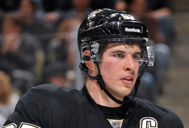 PITTSBURGH, PA - DECEMBER 5:  Sidney Crosby #87 of the Pittsburgh Penguins waits for a face off against the Boston Bruins on December 5, 2011 at CONSOL Energy Center in Pittsburgh, Pennsylvania.  (Photo by Jamie Sabau/Getty Images)