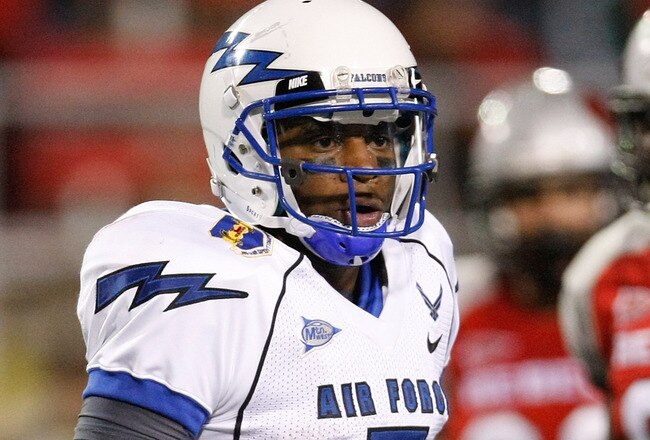 LAS VEGAS - NOVEMBER 18:  Quarterback Tim Jefferson Jr. #7 of the Air Force Falcons gets instructions from his sideline during a game against the UNLV Rebels at Sam Boyd Stadium November 18, 2010 in Las Vegas, Nevada. Air Force won 35-20.  (Photo by Ethan Miller/Getty Images)