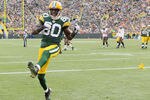 GREEN BAY, WI - NOVEMBER 20:   Donald Driver #80 of the Green Bay Packers celebrates after  E.J. Biggers of the Tampa Bay Buccaneers is called for pass interference on November 20,2011 at Lambeau Field in Green Bay, Wisconsin.  (Photo by Elsa/Getty Images)