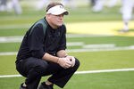 EUGENE, OR - NOVEMBER 6: Head coach Chip Kelly of the Oregon Ducks watches his team warm up before the game against the Washington Huskies at Autzen Stadium on November 6, 2010 in Eugene, Oregon. (Photo by Steve Dykes/Getty Images)