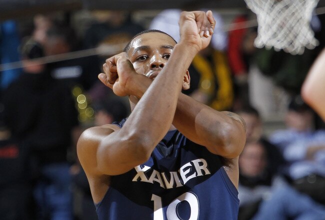 NASHVILLE, TN - NOVEMBER 28: Mark Lyons #10 of the Xavier Musketeers celebrates late in the game against the Vanderbilt Commodores at Memorial Gymnasium on November 28, 2011 in Nashville, Tennessee. Xavier defeated Vanderbilt 82-70 in overtime. (Photo by Joe Robbins/Getty Images)