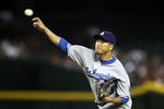 PHOENIX, AZ - SEPTEMBER 27:  Starting pitcher Hiroki Kuroda #18 of the Los Angeles Dodgers pitches against the Arizona Diamondbacks during the Major League Baseball game at Chase Field on September 27, 2011 in Phoenix, Arizona.  (Photo by Christian Petersen/Getty Images)