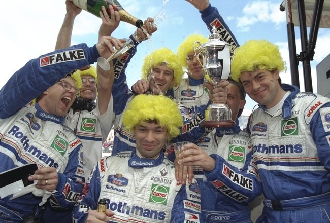 26 Oct 1997:  The Williams team celebrate their driver Jacques Villeneuve of Canada becoming World Champion after the European Grand Prix in Jerez, Spain. Villeneuve finished third in the race and won the Drivers Championship. \ Mandatory Credit: Mark Thompson /Allsport
