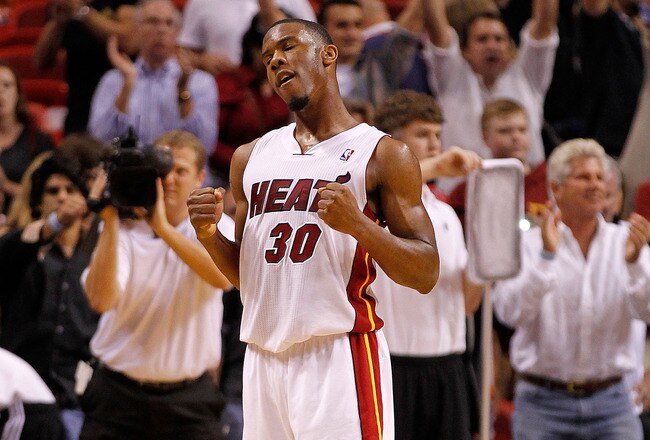 MIAMI, FL - DECEMBER 27: Norris Cole #30 of the Miami Heat reacts after winning a game against the Boston Celtics at American Airlines Arena on December 27, 2011 in Miami, Florida. NOTE TO USER: User expressly acknowledges and agrees that, by downloading and/or using this Photograph, User is consenting to the terms and conditions of the Getty Images License Agreement.  (Photo by Mike Ehrmann/Getty Images)