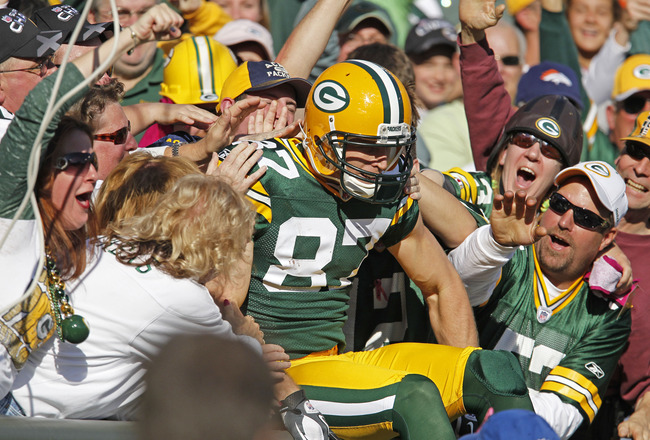 GREEN BAY, WI - OCTOBER 2: Jordy Nelson #87 of the Green Bay Packers does a Lambeau Leap after scoring a touchdown against the Denver Broncos at Lambeau Field on October 2, 2011 in Green Bay, Wisconsin. (Photo by Matt Ludtke /Getty Images)