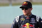 HOMESTEAD, FL - NOVEMBER 19:  Kasey Kahne, driver of the #4 Red Bull Toyota, stands on the grid during qualifying for the NASCAR Sprint Cup Series Ford 400 at Homestead-Miami Speedway on November 19, 2011 in Homestead, Florida.  (Photo by Jerry Markland/Getty Images for NASCAR)