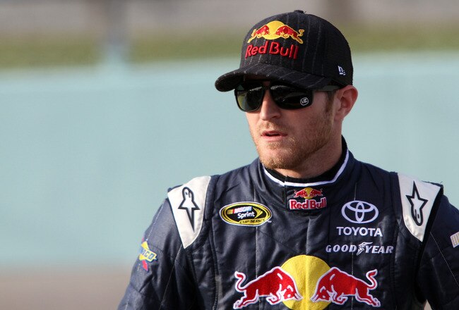 HOMESTEAD, FL - NOVEMBER 19:  Kasey Kahne, driver of the #4 Red Bull Toyota, stands on the grid during qualifying for the NASCAR Sprint Cup Series Ford 400 at Homestead-Miami Speedway on November 19, 2011 in Homestead, Florida.  (Photo by Jerry Markland/Getty Images for NASCAR)
