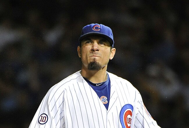 CHICAGO, IL - AUGUST 09:  Starting pitcher Matt Garza #17 of the Chicago Cubs stands on the mound after giving up a two-run home run to Jonny Gomes #30 of the Washington Nationals during the sixth inning at Wrigley Field on August 9, 2011 in Chicago, Illinois. Jayson Werth also scored on the home run.  (Photo by Brian Kersey/Getty Images)
