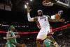 MIAMI, FL - DECEMBER 27:  LeBron James #6 of the Miami Heat dunks during a game against the Boston Celtics at American Airlines Arena on December 27, 2011 in Miami, Florida. NOTE TO USER: User expressly acknowledges and agrees that, by downloading and/or using this Photograph, User is consenting to the terms and conditions of the Getty Images License Agreement.  (Photo by Mike Ehrmann/Getty Images)