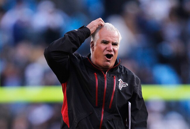 CHARLOTTE, NC - DECEMBER 11:  Head coach Mike Smith of the Atlanta Falcons watches on during their game against the Carolina Panthers at Bank of America Stadium on December 11, 2011 in Charlotte, North Carolina.  (Photo by Streeter Lecka/Getty Images)