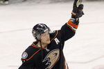 WINNIPEG, CANADA - DECEMBER 17: Teemu Selanne #8 of the Anaheim Ducks waves to fans as they cheer him in the arena after a game against the Winnipeg Jets at the MTS Centre on December 17, 2011 in Winnipeg, Manitoba, Canada. This is the first time Selanne has returned to play hockey in Winnipeg, where he began his NHL hockey career with the original Winnipeg Jets in 1992. (Photo by Marianne Helm/Getty Images)