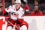 OTTAWA, ON - NOVEMBER 27:  Joni Pitkanen #25 of the Carolina Hurricanes controls the puck along the far boards in a game against the Ottawa Senators at Scotiabank Place on November 27, 2011 in Ottawa, Canada.  (Photo by Phillip MacCallum/Getty Images)