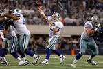 ARLINGTON, TX - DECEMBER 11:  Tony Romo #9 of the Dallas Cowboys looks for an open receiver against the New York Giants at Cowboys Stadium on December 11, 2011 in Arlington, Texas.  (Photo by Tom Pennington/Getty Images)