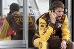 DAYTONA BEACH, FL - NOVEMBER 15:  David Ragan, driver of the #6 UPS Ford waits in the garage during the NASCAR Fuel Injection Test at Daytona International Speedway on November 15, 2011 in Daytona Beach, Florida.  (Photo by Jerry Markland/Getty Images for NASCAR)