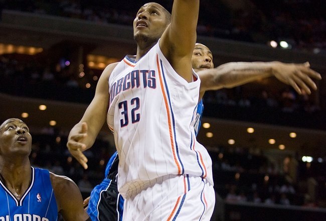 CHARLOTTE, NC - APRIL 26: Boris Diaw #32 of the Charlotte Bobcats drives to the basket past Dwight Howard #12 of the Orlando Magic at Time Warner Cable Arena on April 26, 2010 in Charlotte, North Carolina.  The Magic defeated the Bobcats 99-90 to complete the four game sweep.  NOTE TO USER: User expressly acknowledges and agrees that, by downloading and or using this Photograph, user is consenting to the terms and conditions of the Getty Images License Agreement.   (Photo by Brian A. Westerholt/Getty Images)